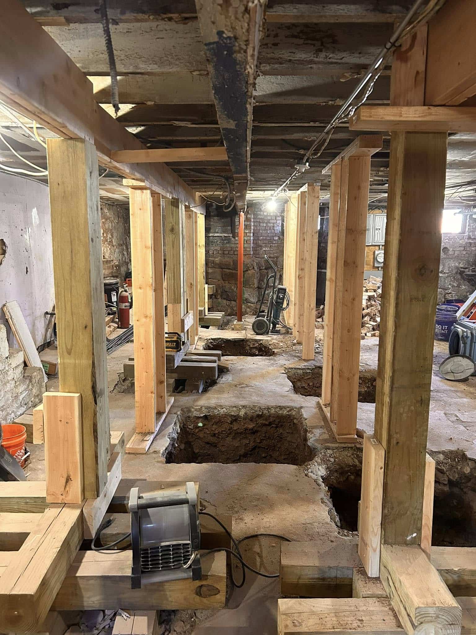 Three-Family Home Foundation Revival – completed project